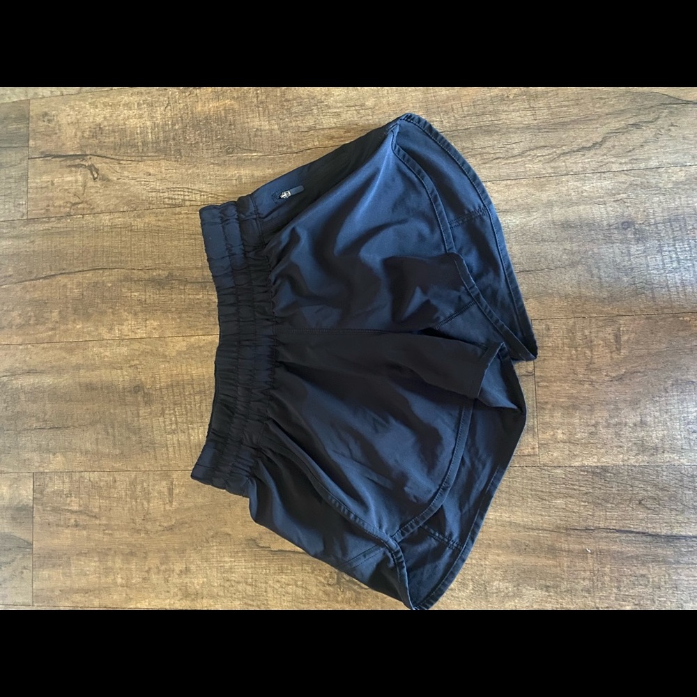 Lululemon Black Tracker Short V *4” size 6